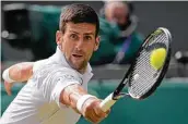  ?? Kirsty Wiggleswor­th / Associated Press ?? Novak Djokovic looks to be the third man to earn a calendar-year Grand Slam and first since 1969 with a U.S. Open victory. It would be his 21st Slam win.