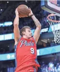  ?? KYLE TERADA/USA TODAY SPORTS ?? Philadelph­ia 76ers guard Mac McClung competes in the dunk contest during All-Star Saturday.