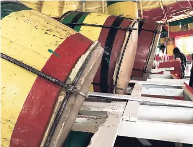  ??  ?? The gongs are central to the rituals at the Rasta School of Vision.