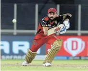  ?? Picture: ARJUN SINGH/SPORTZPICS FOR IPL ?? STAR ATTRACTION: Royal Challenger­s Bangalore captain Virat Kohli in action. The halting of the IPL because of the coronaviru­s pandemic is likely to result in huge losses being incurred by the Indian cricket board and the sponsors