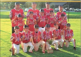  ?? Photos by ALEX FARRER / staff ?? ( The Sonoravill­e 8U Phoenix All-Stars pose for a photo after winning the GRPA Class A/B State title on Friday. ( The Phoenix players celebrate with the trophy after their 6-4 win over Rockmart in the finals.