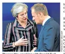  ??  ?? Theresa May speaking with Donald Tusk, the European Council president, yesterday