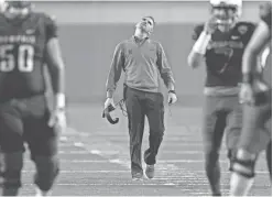  ?? JIM WEBER/THE COMMERCIAL APPEAL ?? University of Memphis Head Coach Mike Norvell reacts after a botched play during the Tigers’ annual spring scrimmage at the Liberty Bowl Friday Night.