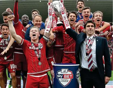  ?? GETTY IMAGES ?? Red and done: Karanka celebrates after clinching promotion to the top flight