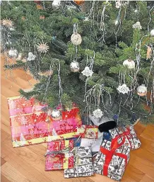  ?? GETTY ?? Regalos debajo de un árbol de Navidad.