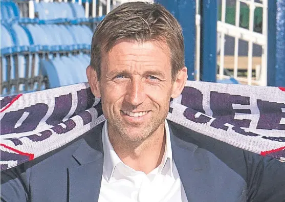  ?? Picture: Steve Brown. ?? Neil McCann is unveiled as permanent Dundee manager last night after his dramatic U-turn 24 hours earlier.