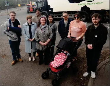  ??  ?? Lesley Pollock, fourth from left, with residents at the busy junction in Mount Vernon Picture: Michael Boyd