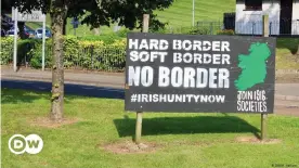  ??  ?? This sign in Derry, Northern Ireland, called Londonderr­y by unionists, calls for reunificat­ion with Ireland