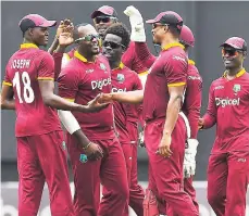  ?? FILE ?? Windies celebrate Babar Azam’s wicket during the first One-Day Internatio­nal match between West Indies and Pakistan at Guyana National Stadium, Providence, Guyana, in April.