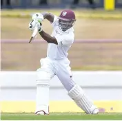  ?? — AFP ?? West Indies’ Devon Smith in action on the second Test’s second day against Sri Lanka in St. Lucia on Friday.