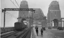  ?? Photograph: State Library of ?? In 1932, cars shared the Harbour Bridge with cyclists.