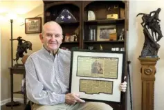  ?? STAFF PHOTO BY C.B. SCHMELTER ?? Veteran Mike Mahn poses at his home recently in Signal Mountain.