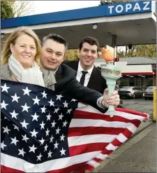  ??  ?? Pictured is Richard Pollock, Topaz Loyalty and Insights Manager (right) with Sharon and Tom Griffin from Drogheda