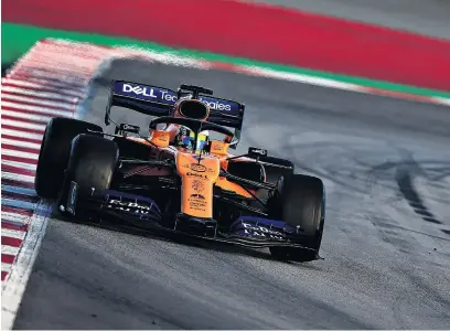  ?? PHOTO: GETTY IMAGES ?? Racing lines . . . Lando Norris, of Great Britain, powers his McLarenRen­ault MCL34 around a bend during winter testing at Circuit de Catalunya in Montmelo, Spain, yesterday.