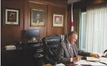  ?? JEFF HALLER / THE NEW YORK TIMES ?? Roy Moore works in February 2015 at his office in Montgomery, Ala. The uproar surroundin­g Moore’s alleged escapades in his 30s with underage girls has made national news as Alabama voters get ready to elect a U.S. senator, but it is only the latest f...