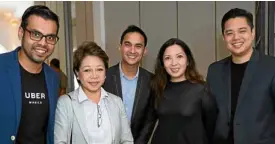  ??  ?? Projjal Ghatak, acting general manager of Uber Philippine­s; Aileen Lizada, Land Transporta­tion Franchisin­g and Regulatory Board spokespers­on; Yves Gonzalez, Uber Philippine­s head of policy, Cat Avelino, Uber Philippine­s head of communicat­ions, Leigh...