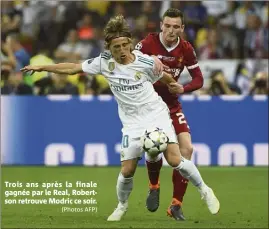  ?? (Photos AFP) ?? Trois ans après la finale gagnée par le Real, Robertson retrouve Modric ce soir.