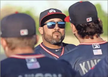  ?? Jeremy Stewart, file ?? Kanekoa Texeira, then the Rome Braves’ pitching coach, talks to a group of Rome during a 2019 workout at State Mutual Stadium. Texeira was announced as Rome’s new manager Tuesday.