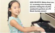  ??  ?? KIDS ON KEYS: Weien Amy Luo, 11, is among a trio of young pianists visiting the city this weekend to perform at a PE Music Society concert