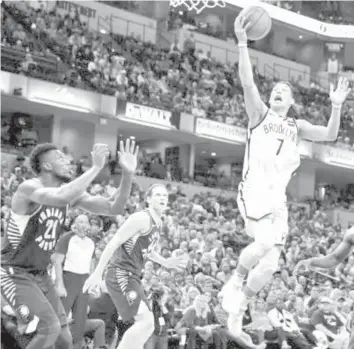  ?? ASSOCIATED PRESS ?? Brooklyn Nets guard Jeremy Lin shoots over Indiana Pacers forward Thaddeus Young during the second half of an NBA basketball game in Indianapol­is. The Pacers defeated the Nets 140-131.