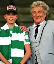  ??  ?? Fans: Alastair and dad at Celtic Park in 2019