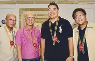  ??  ?? Kapampanga­n o cials pay tribute to world-class Kapampanga­n artists. Board Member Tonton Torres (second from right) and San Fernando Vice Mayor Jimmy Lazatin (second from left) with Department of Tourism regional director Ronnie Tiotuico (left) and...