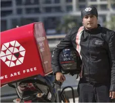  ?? Antonie Robertson / The National ?? Pizza delivery company Freedom Pizza seeks to promote a strong safety culture among its staff