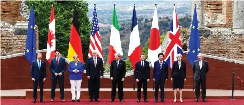  ??  ?? (From left) Tusk, Canadian Prime Minister Justin Trudeau, German Chancellor Angela Merkel, Trump, Italian Prime Minister Paolo Gentiloni, French President Emmanuel Macron, Japanese Prime Minister Shinzo Abe, May and Juncker pose for a family photo at...