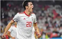  ?? –AFP ?? READY TO FIRE: Iran’s forward Sardar Azmoun celebrates after scoring a goal during the AFC Asian Cup Group D match against Yemen in Abu Dhabi.