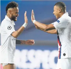  ?? Photo / AP ?? The star power of Neymar (left) and Kylian Mbappe helped get PSG over the line late in their game against Atalanta.