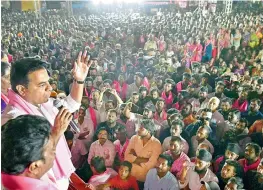  ?? — S. SURENDER REDDY ?? Caretaker minister K.T. Rama Rao campaigns at Ameerpet in Sanathnaga­r constituen­cy.