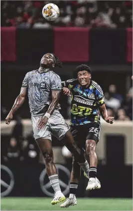  ?? MIKE STEWART/AP ?? Montreal forward Chinonso Offor (left) and United defender Caleb Wiley collide in the first half of United’s 4-1 win Saturday. Wiley is among a group of players who will get some rest in the off-week, after putting in a lot of minutes during the last three matches.