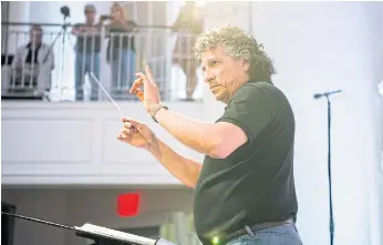  ??  ?? RIGHT NOTES: Conductor Giancarlo Guerrero, music director of the Nashville Symphony, leads the National Youth Orchestra of the United States in New York this month.