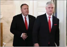  ?? DOUG MILLS — THE NEW YORK TIMES ?? Secretary of State Mike Pompeo, left, and national security adviser Robert O’brien have urged a tough response to rocket attacks that killed two U.S. troops near Baghdad.