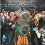  ?? AL BELLO / GETTY IMAGES ?? Deontay Wilder poses with his WBC heavyweigh­t belts after knocking out Luis Ortiz on Saturday.