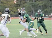  ?? SENTINEL & ENTERPRISE FILE ?? Fitchburg State’s Richard Austin hits Framingham State’s Adam Wojenski during an Oct. 12, 2019, game.