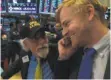  ?? Bryan R. Smith / AFP / Getty Images ?? A trader’s hat tells it all at the New York Stock Exchange.