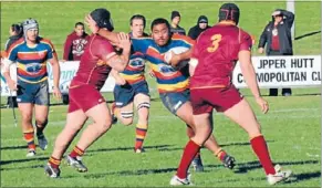  ??  ?? Breaking away: Prop Tolu Fahamokioa makes a bid for Tawa’s half in Saturday’s Upper Hutt game.