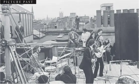  ?? ?? BOWING OUT: The Beatles performing their last live public concert on the rooftop of the Apple Organizati­on building on Savile Row, London, on January 30, 1969