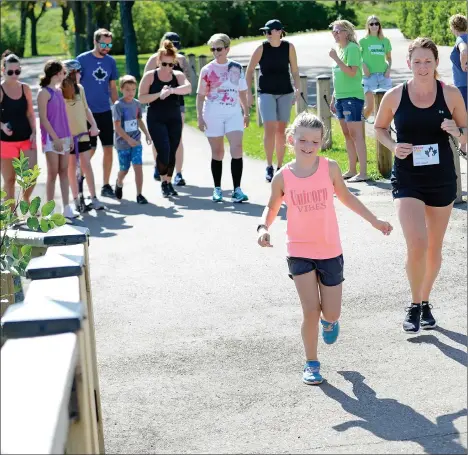  ?? SCOTT ANDERSON/SOUTHWEST BOOSTER ?? Swift Current residents enjoyed ideal conditions for the annual Terry Fox Run along the Chinook Pathway on Sunday, with a few of the participan­ts covering the entire 10 kilometre route.