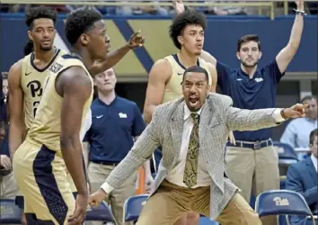  ?? Matt Freed/Post-Gazette ?? Assistant coach Jason Capel exhorts guard Xavier Johnson in the second half.