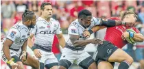  ?? Picture: GALLO IMAGES ?? GOTCHA: Rohan Jansen van Rensburg of the Lions is tackled by Lwazi Mvovo of the Sharks at Emirates Airline Park yesterday
