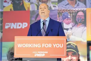  ?? JENNIFER GAUTHIER • REUTERS ?? B.C. Premier John Horgan speaks at the NDP’s election headquarte­rs in Vancouver on Saturday night following his majority provincial government win.