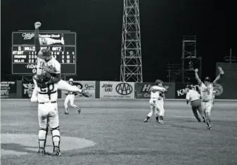  ?? Stanford Athletics 1987 ?? Stanford players celebrate winning the 1987 College World Series. They also won it in 1988.