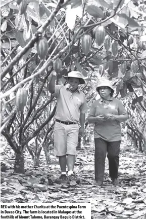  ??  ?? REX with his mother Charita at the Puentespin­a Farm in Davao City. The farm is located in Malagos at the foothills of Mount Talomo, Barangay Baguio District.