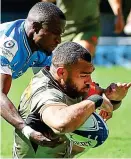  ?? AFP/GETTY IMAGES ?? Power play: Marchant scores Quins’ third try