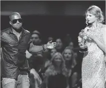  ?? JASON DECROW/THE ASSOCIATED PRESS FILES ?? Kanye West takes the mic from Taylor Swift as she accepts the best female video award in 2009.