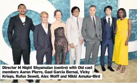  ??  ?? Director M Night Shyamalan (centre) with Old cast members Aaron Pierre, Gael Garcia Bernal, Vicky Krieps, Rufus Sewell, Alex Wolff and Nikki Amuka-bird