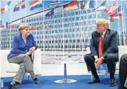  ?? [AP PHOTO] ?? President Donald Trump and German Chancellor Angela Merkel take part in a bilateral meeting, Wednesday in Brussels. Trump declared that a joint natural gas pipeline venture with Moscow has left Merkel’s government “totally controlled” and “captive to...
