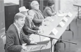  ?? Ashley Landis / The Dallas Morning News ?? One of 10 gubernator­ial candidates, Andrew White, left, speaks during a forum hosted by the Tom Green County Democratic Club on Monday. Each candidate was given five minutes to speak.